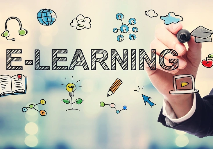 Businessman drawing E-Learning concept