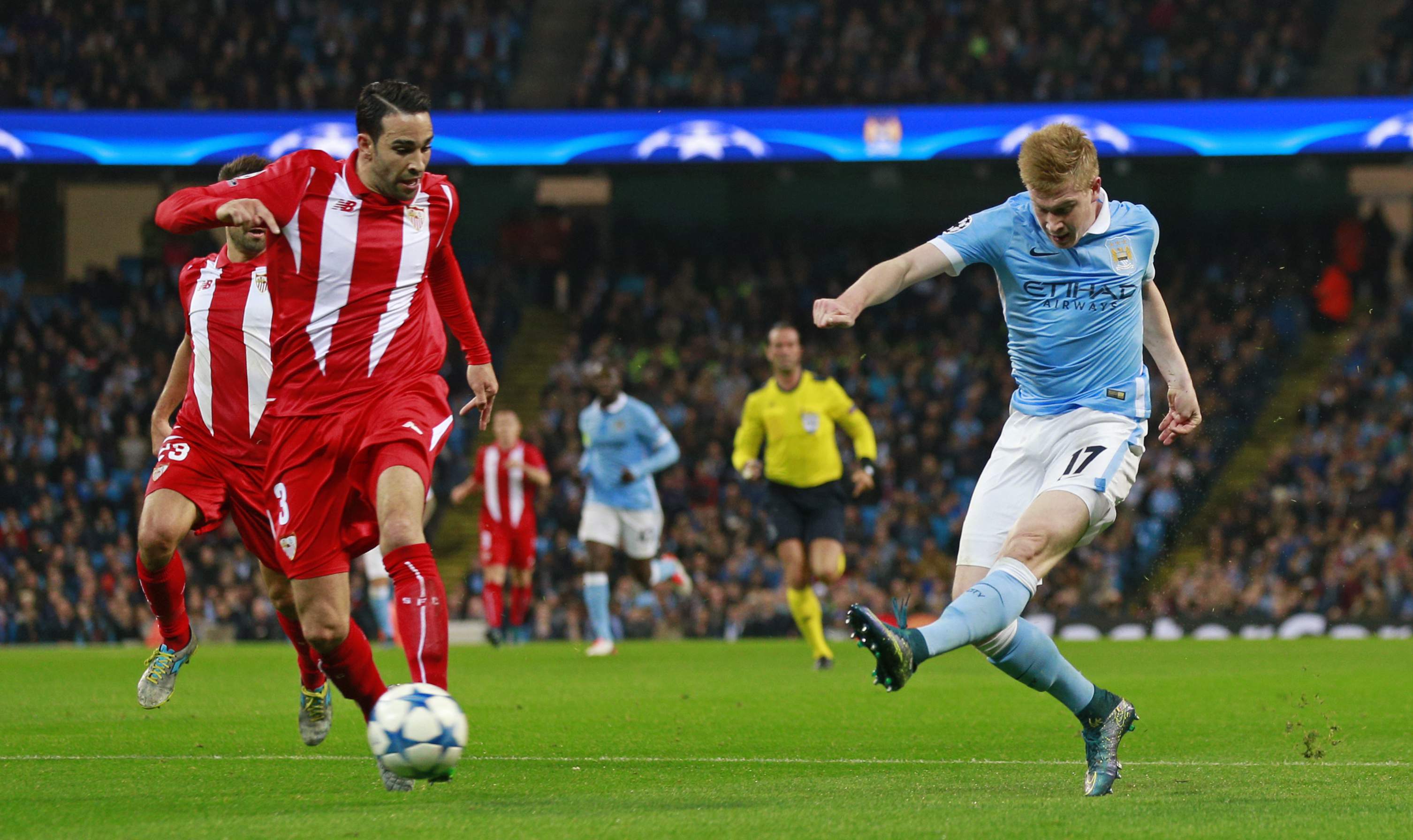 Football - Manchester City v Sevilla - UEFA Champions League Group Stage - Group D - Etihad Stadium, Manchester, England - 21/10/15 Manchester City's Kevin De Bruyne in action with Sevilla's Adil Rami Action Images via Reuters / Jason Cairnduff Livepic EDITORIAL USE ONLY.