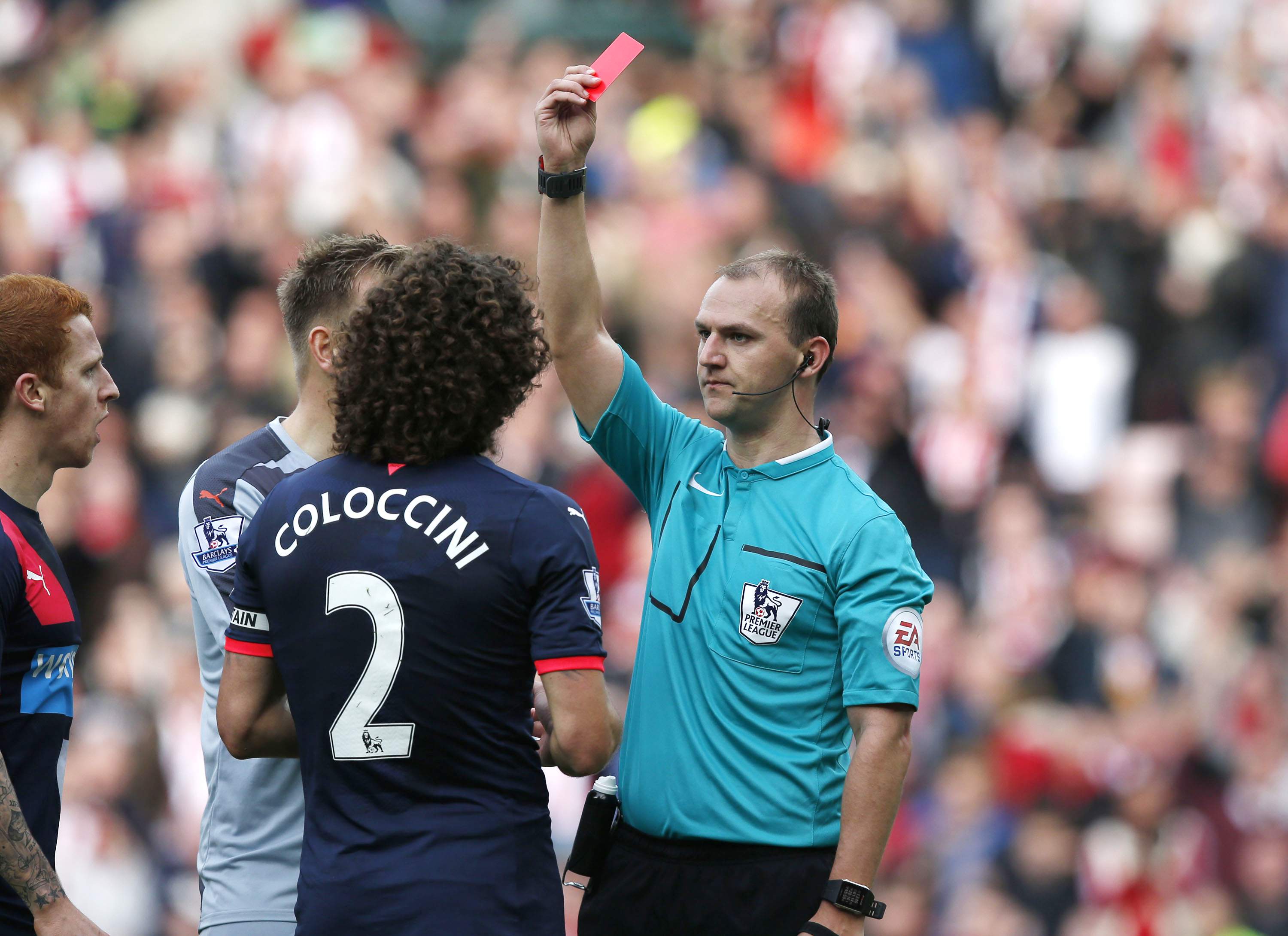 Football - Sunderland v Newcastle United - Barclays Premier League - Stadium of Light - 25/10/15 Newcastle's Fabricio Coloccini is sent off by referee Robert Madley Reuters / Andrew Yates Livepic EDITORIAL USE ONLY. No use with unauthorized audio, video, data, fixture lists, club/league logos or "live" services. Online in-match use limited to 45 images, no video emulation. No use in betting, games or single club/league/player publications.  Please contact your account representative for further details.