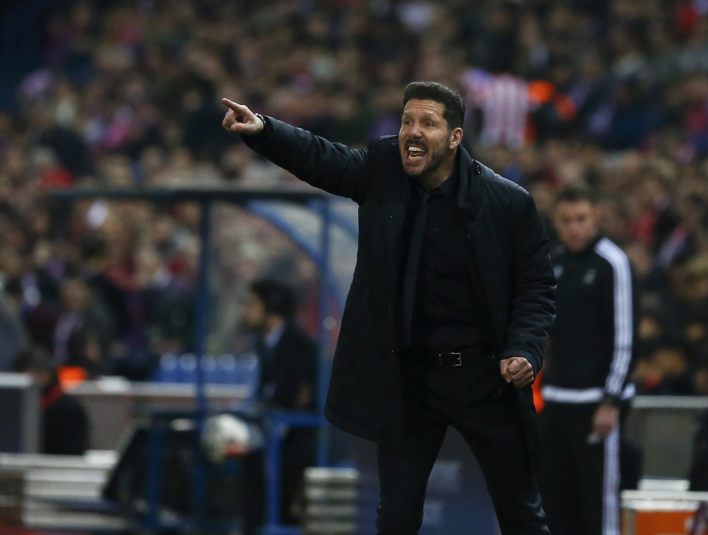 Football Soccer - Atletico Madrid v PSV Eindhoven - UEFA Champions League Round of 16 Second Leg - Vicente Calderon stadium, Madrid, Spain - 15/3/16 Atletico Madrid's coach Diego "Cholo" Simeone gestures during the match. REUTERS/Sergio Perez